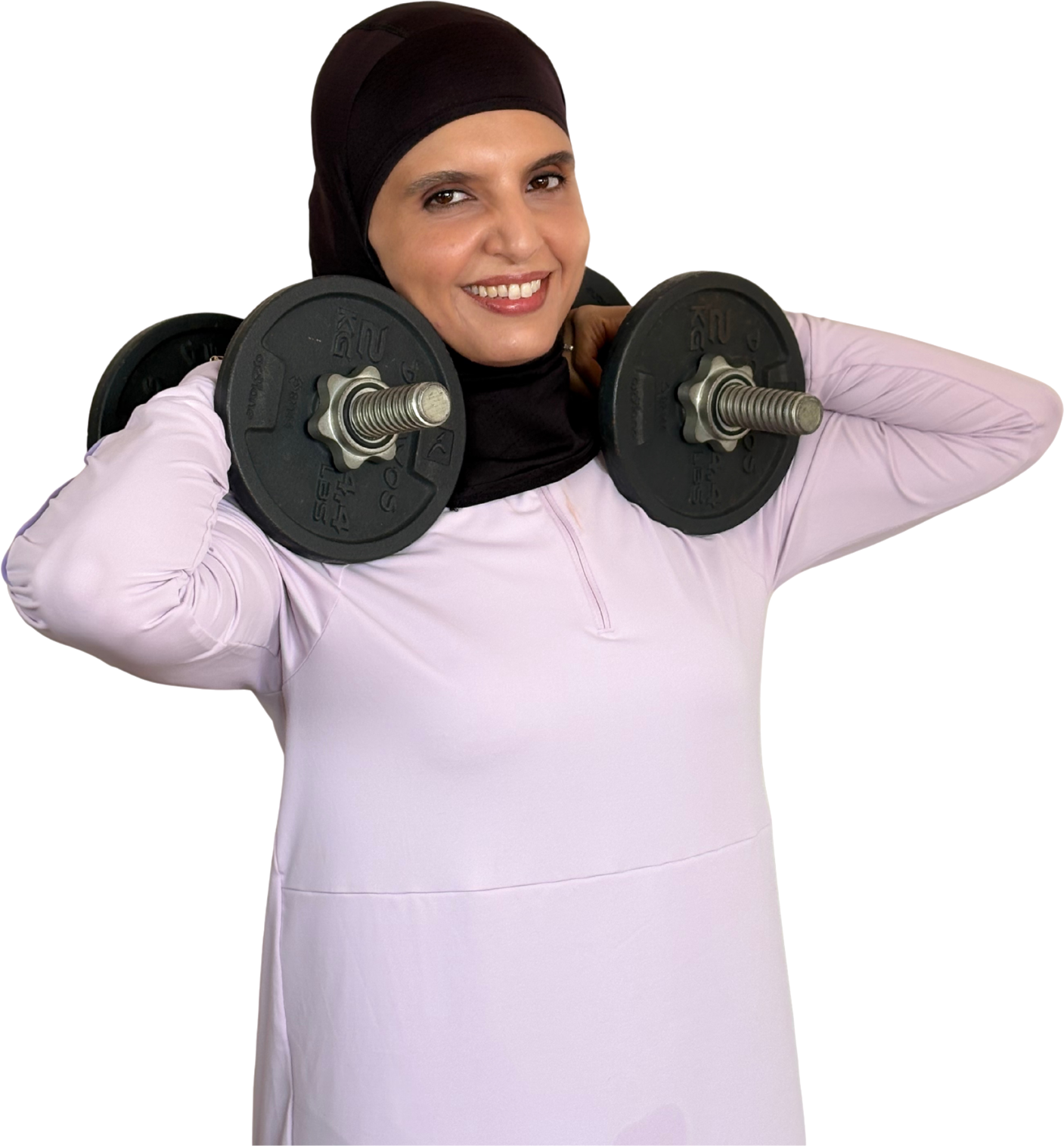 Coach Hebah holding a dumbbell across her shoulders